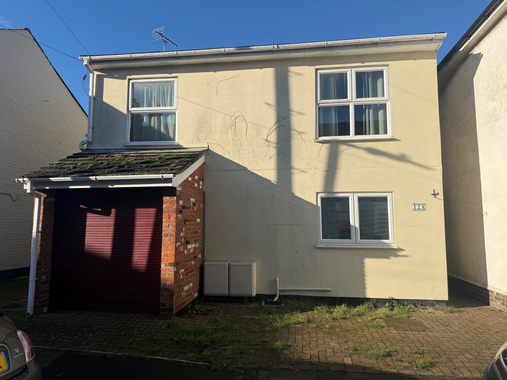 Lot: 141 - DETACHED FOUR-BEDROOM HOUSE FOR IMPROVEMENT - Front of property showing garage and parking